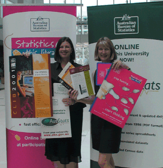 ACT LEP Coordinator Kate Mason (left) and LEP Promotions Officer Kay Barney display LEP promotional materials available for Library and Information Week