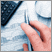 Image: Hand working with calculator