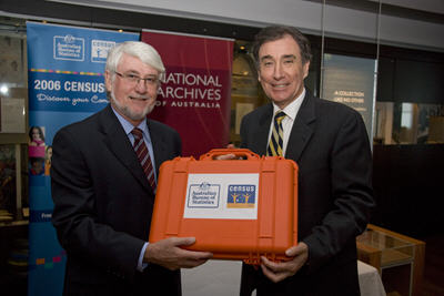 Australian Statistician Mr Brian Pink hands over the Time Capsule to Mr Ross Gibbs, Australian Archives