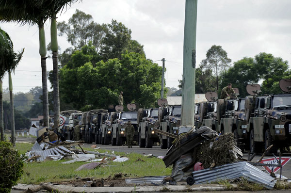 January 2011 –  Parked in the town of Grantham is a line of Army Bushmaster Protected Mobility Vehicles. Operation QUEENSLAND FLOOD ASSIST.