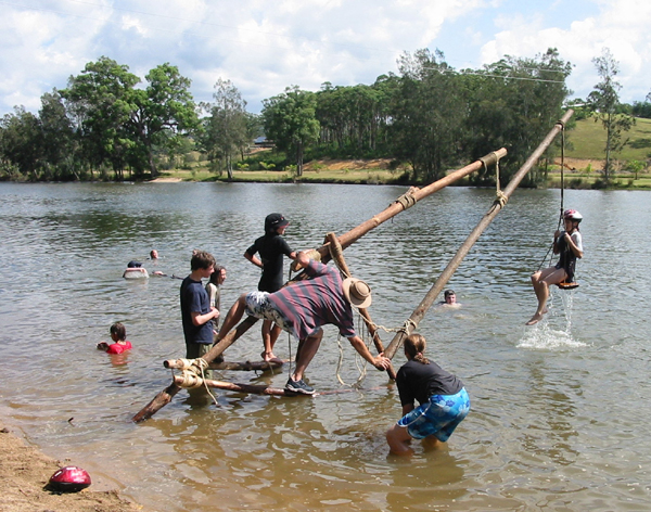 Photograph: Scouts have fun on a dunking machine they constructed – courtesy Maren Child.