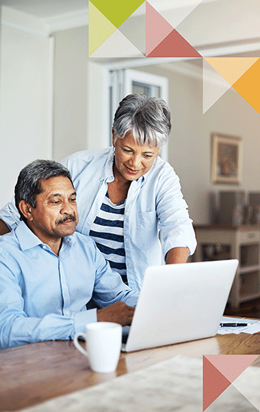 Photo of couple on a laptop