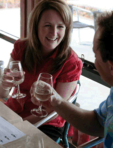 Two people enjoying a glass of wine