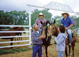 Image: People and horses on a property